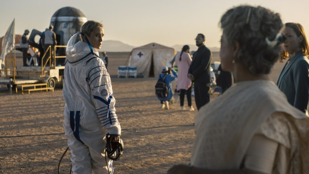 Peri Baumeister as Paula Groth, Sheeba Chaddha as Benisha Mudhi and Katharina Schüttler as Nora on the set of Das Signal, Courtesy of Netflix 2023